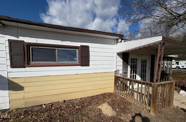 a view of house with outdoor space