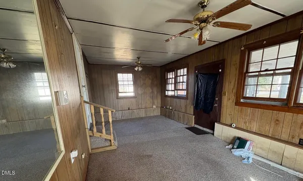 a view of entryway and hall with a window