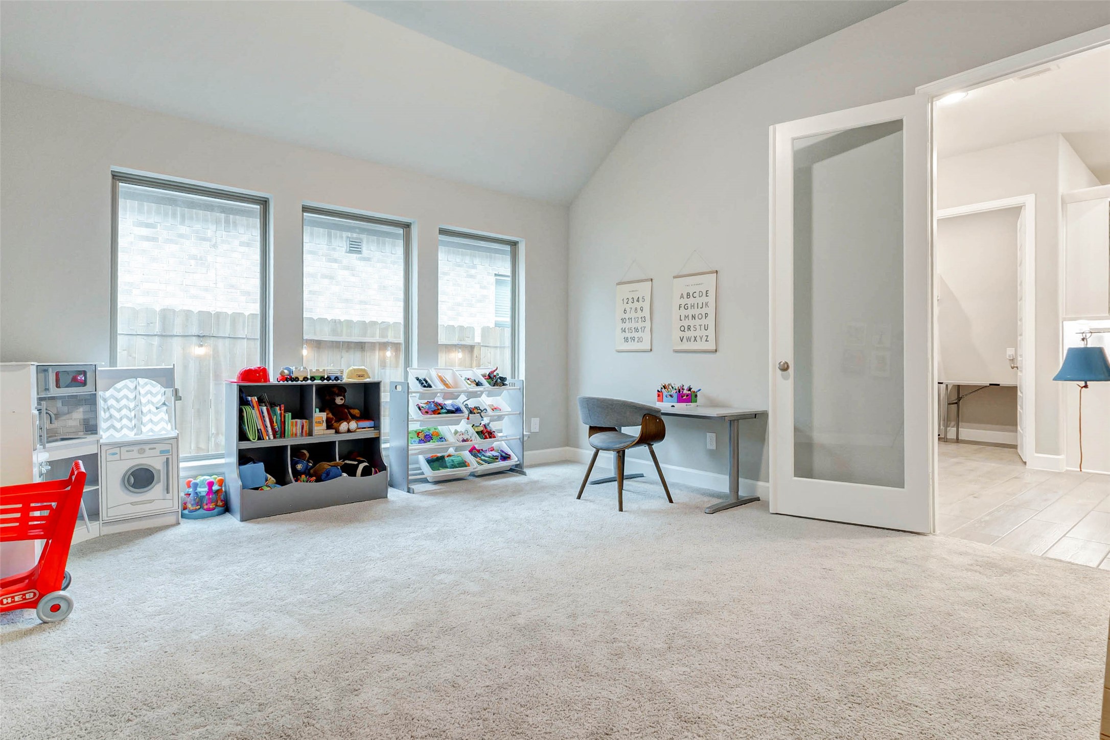 4714 Southpoint Way Fulshear, TX 77441 - Photo 20 of 45 a view of a livingroom with workspace and a window