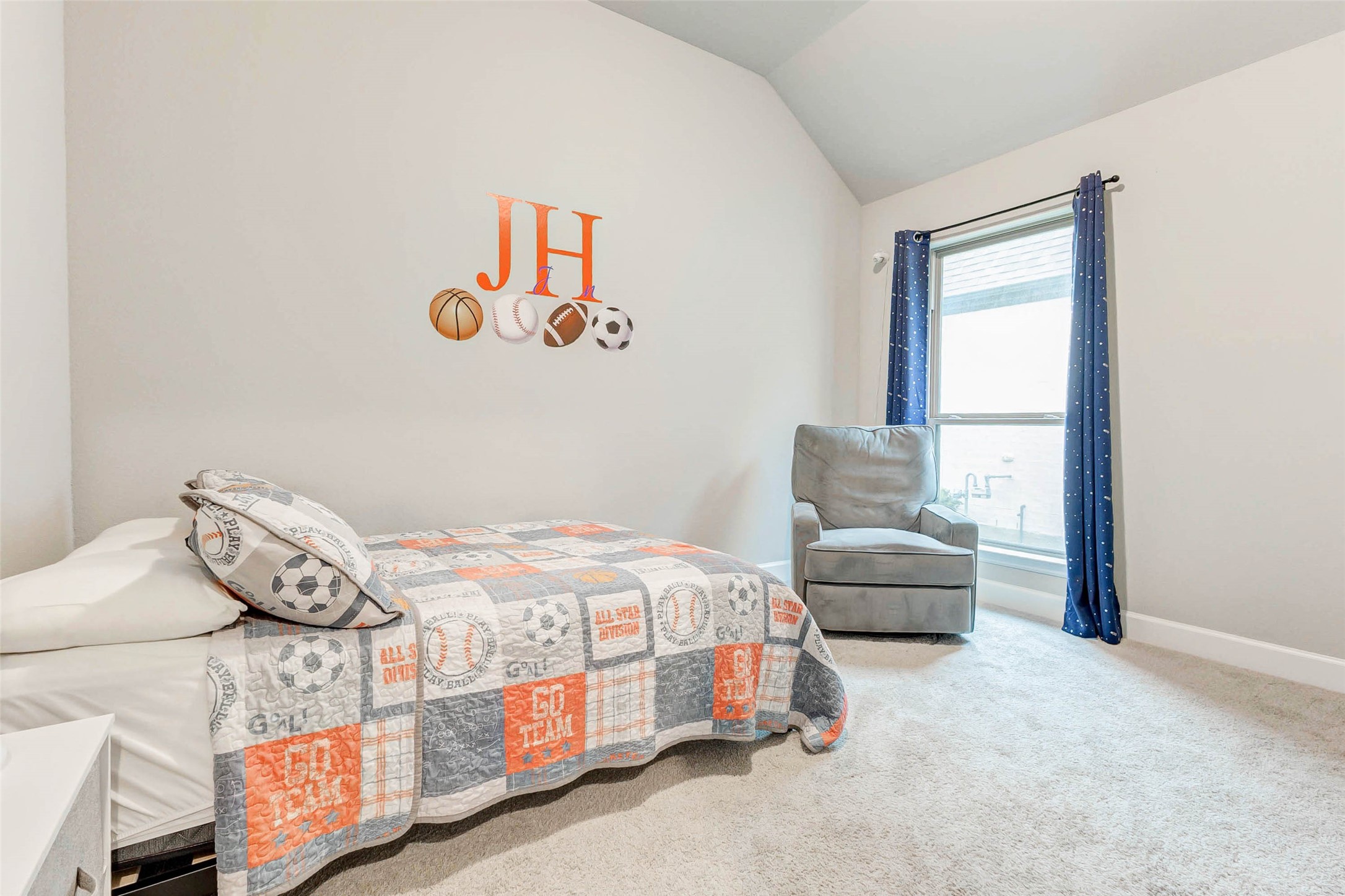 4714 Southpoint Way Fulshear, TX 77441 - Photo 21 of 45 a bedroom with a bed and a couch