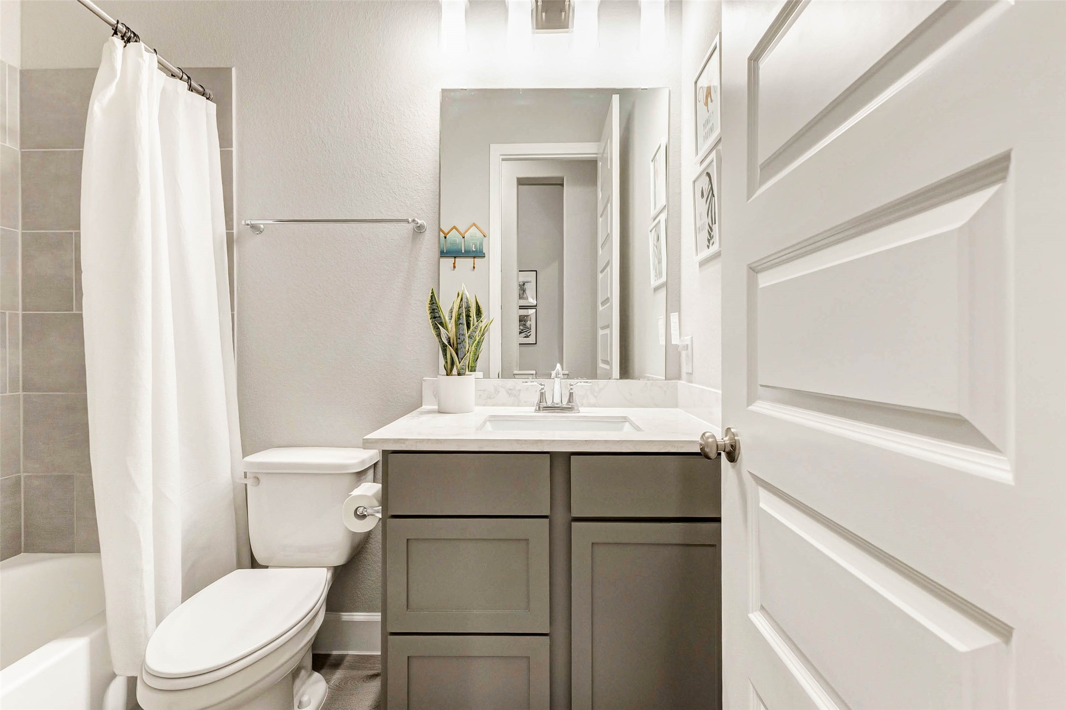 4714 Southpoint Way Fulshear, TX 77441 - Photo 22 of 45 a bathroom with a toilet sink and mirror