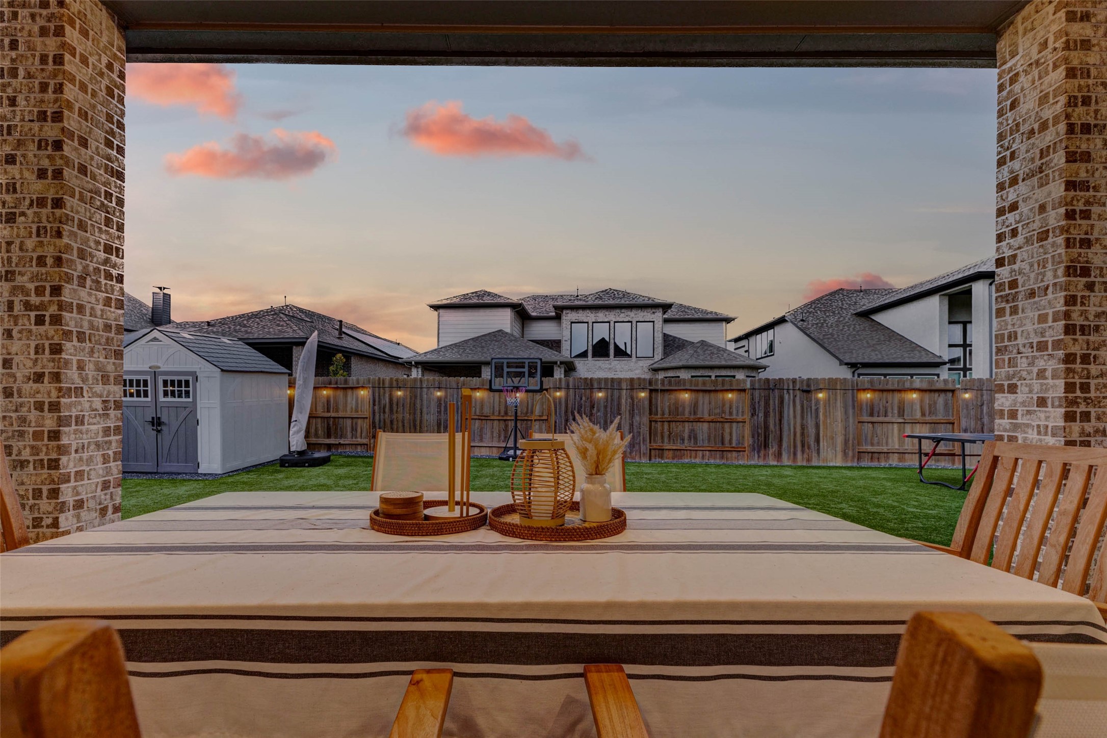 4714 Southpoint Way Fulshear, TX 77441 - Photo 28 of 45 a view of a house with backyard and a tree