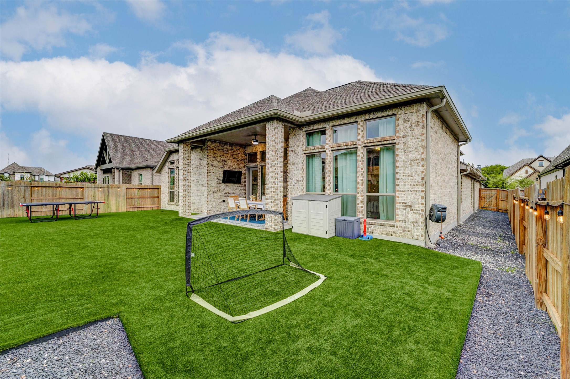 4714 Southpoint Way Fulshear, TX 77441 - Photo 32 of 45 a view of a house with a backyard