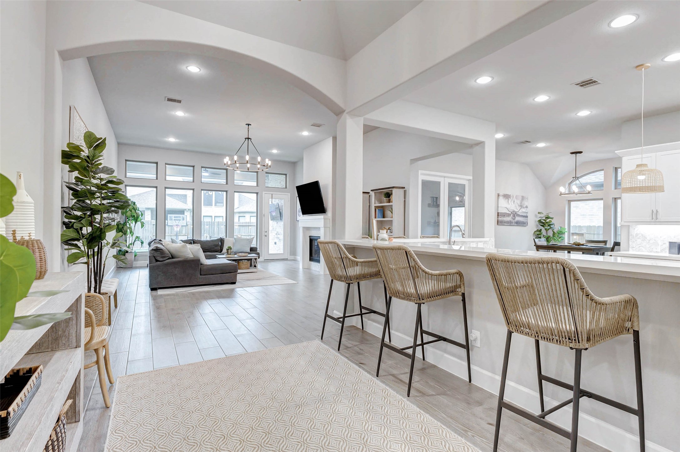 4714 Southpoint Way Fulshear, TX 77441 - Photo 4 of 45 a living room with furniture and a large window