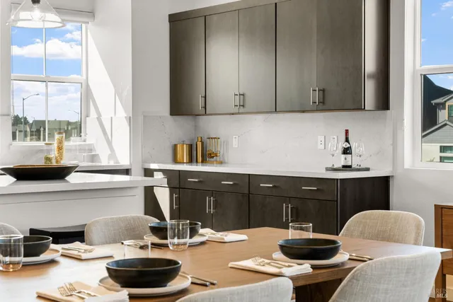 a kitchen with a sink and a stove