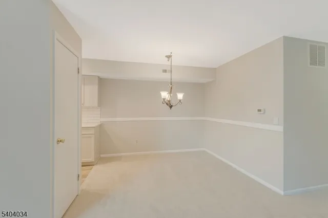 a view of a room with an empty space