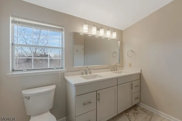 a view of a balcony with a tree