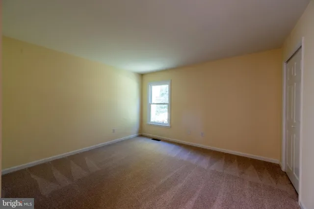 a view of a living room and wooden floor