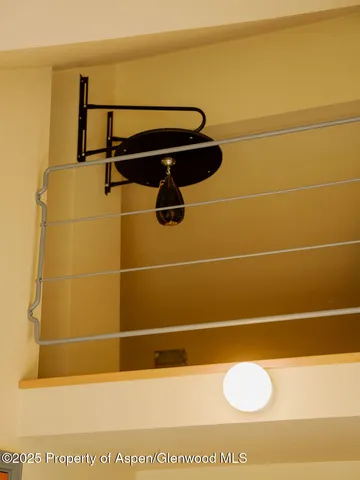 a close view of a utility room with dryer and washer