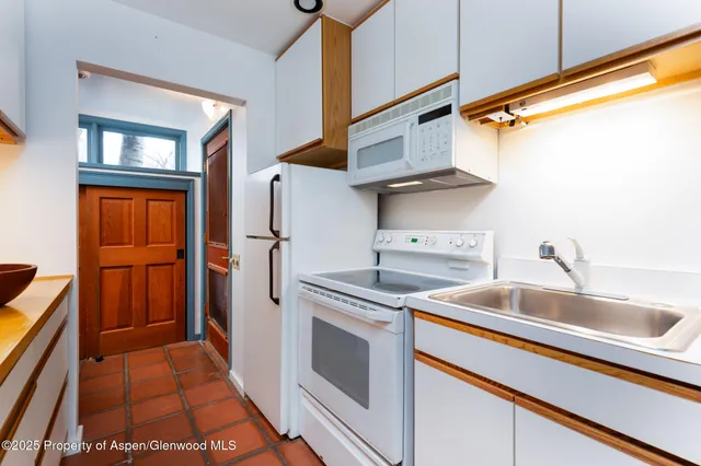 a view of a house with a swimming pool