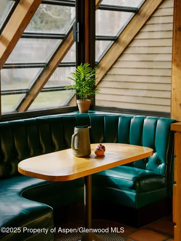 a view of a dining room with furniture