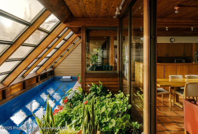 a view of balcony and yard with wooden floor