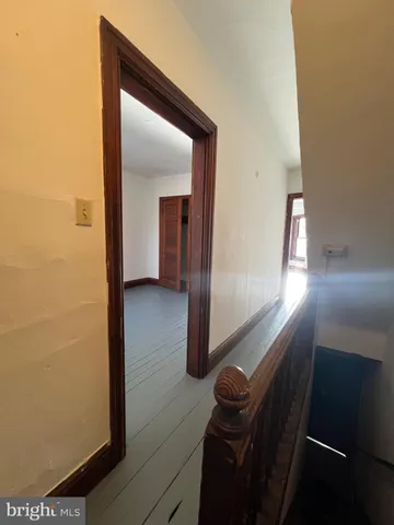 a view of front door and bedroom