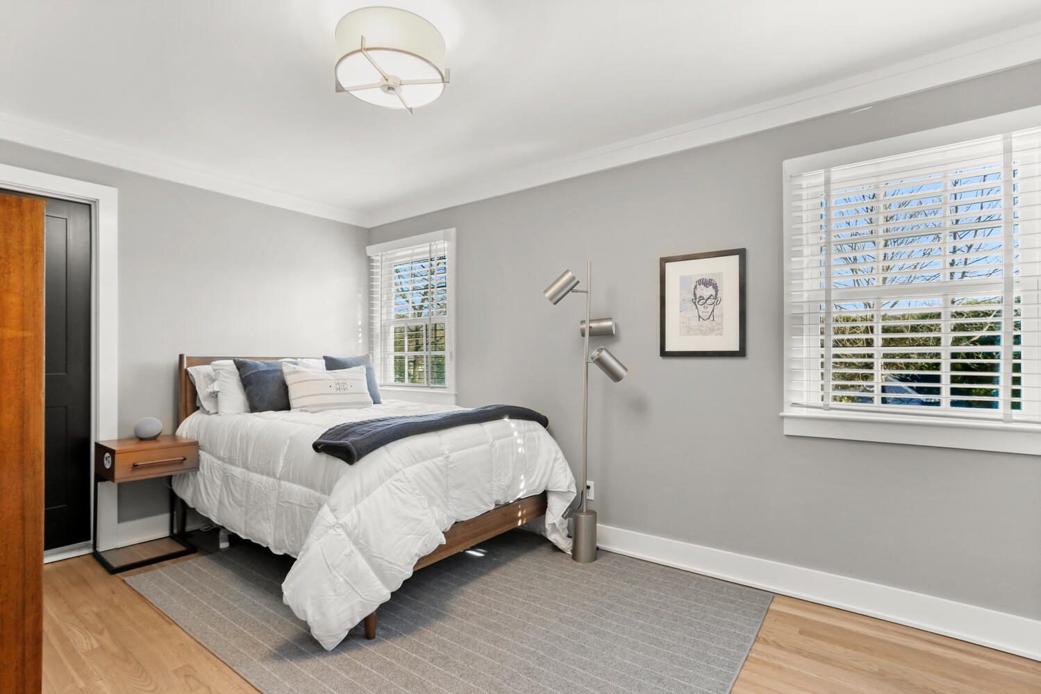 50 Summit Ridge Road New Canaan, CT 06840 - Photo 33 of 49 a bedroom with a bed lamp and a window