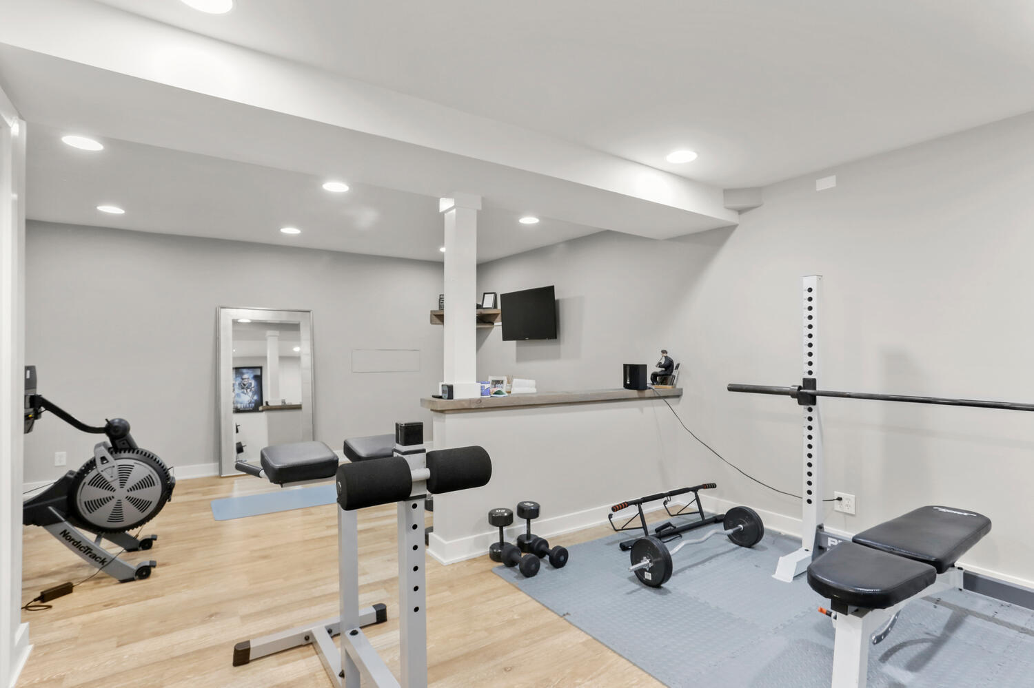 50 Summit Ridge Road New Canaan, CT 06840 - Photo 39 of 49 a room with furniture and a flat screen tv