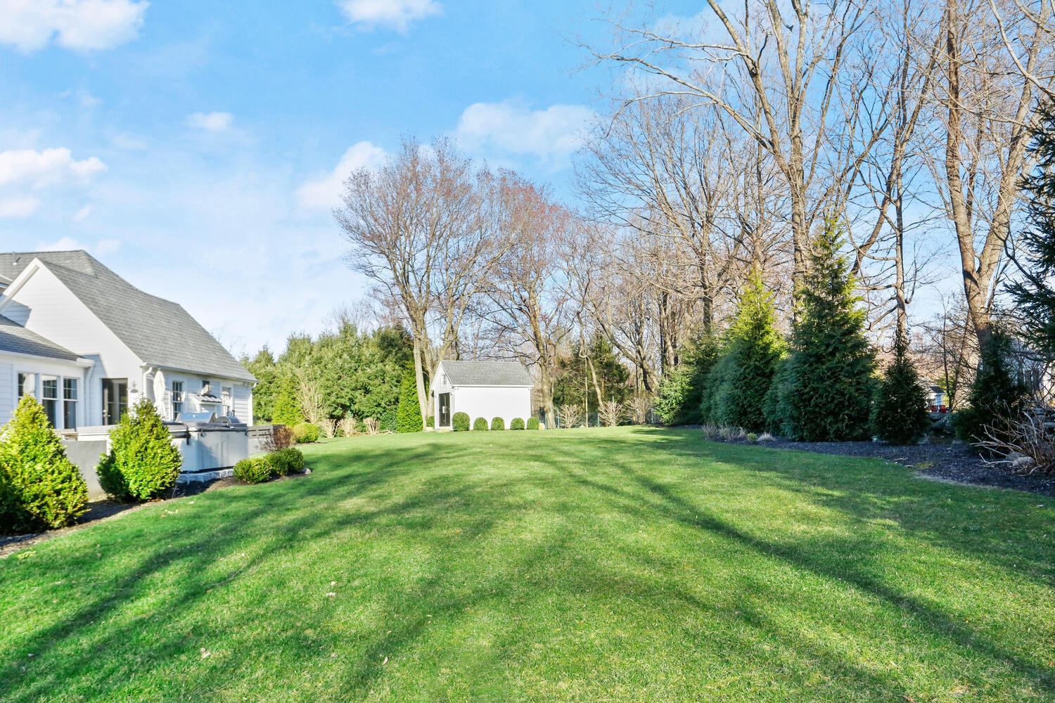 50 Summit Ridge Road New Canaan, CT 06840 - Photo 4 of 49 a big yard with large trees