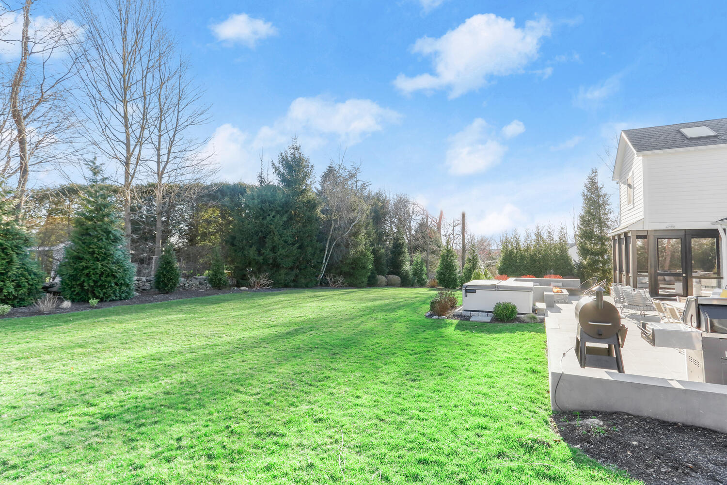 50 Summit Ridge Road New Canaan, CT 06840 - Photo 49 of 49 a view of a backyard with sitting area