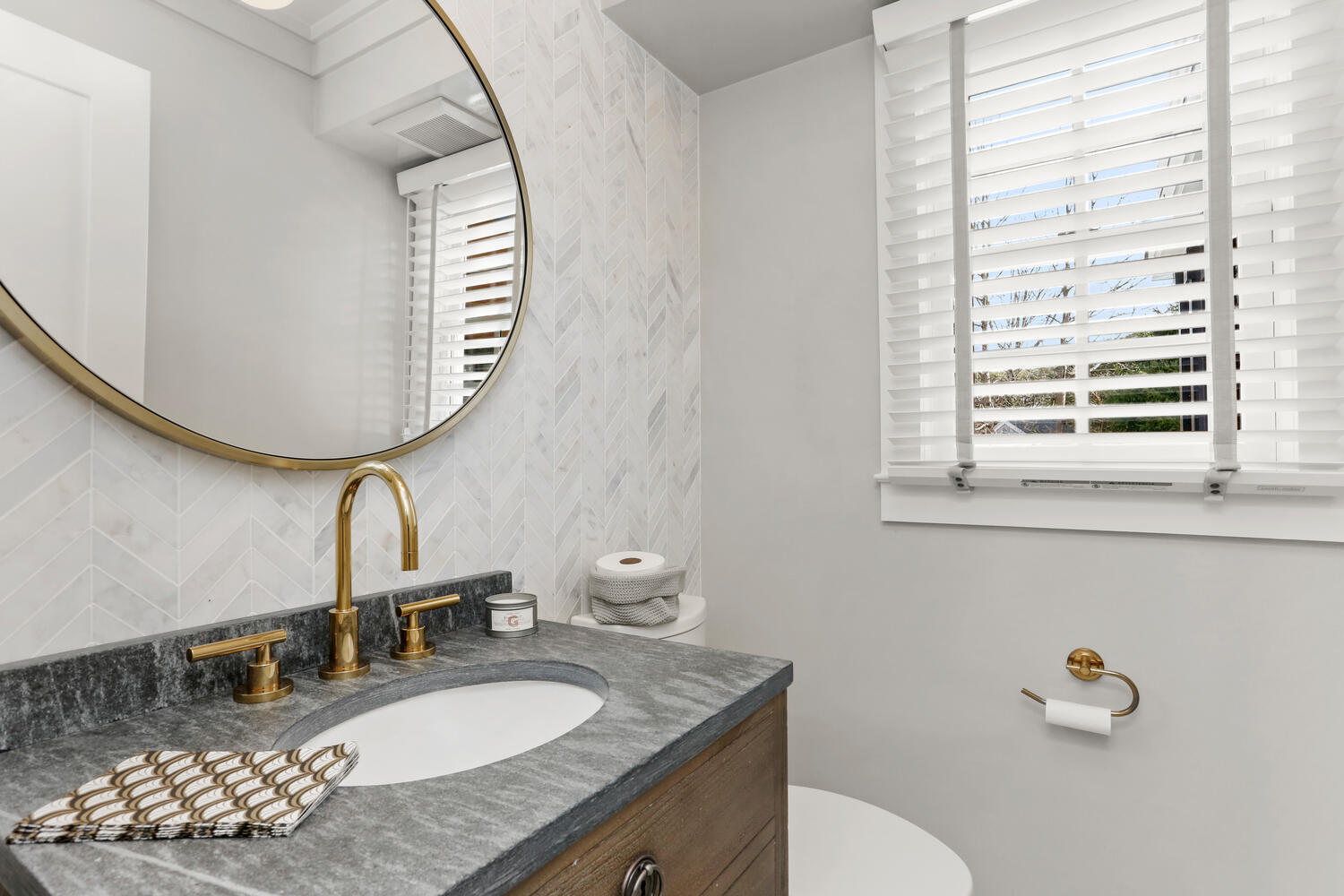 50 Summit Ridge Road New Canaan, CT 06840 - Photo 9 of 49 a bathroom with a granite countertop sink and a mirror