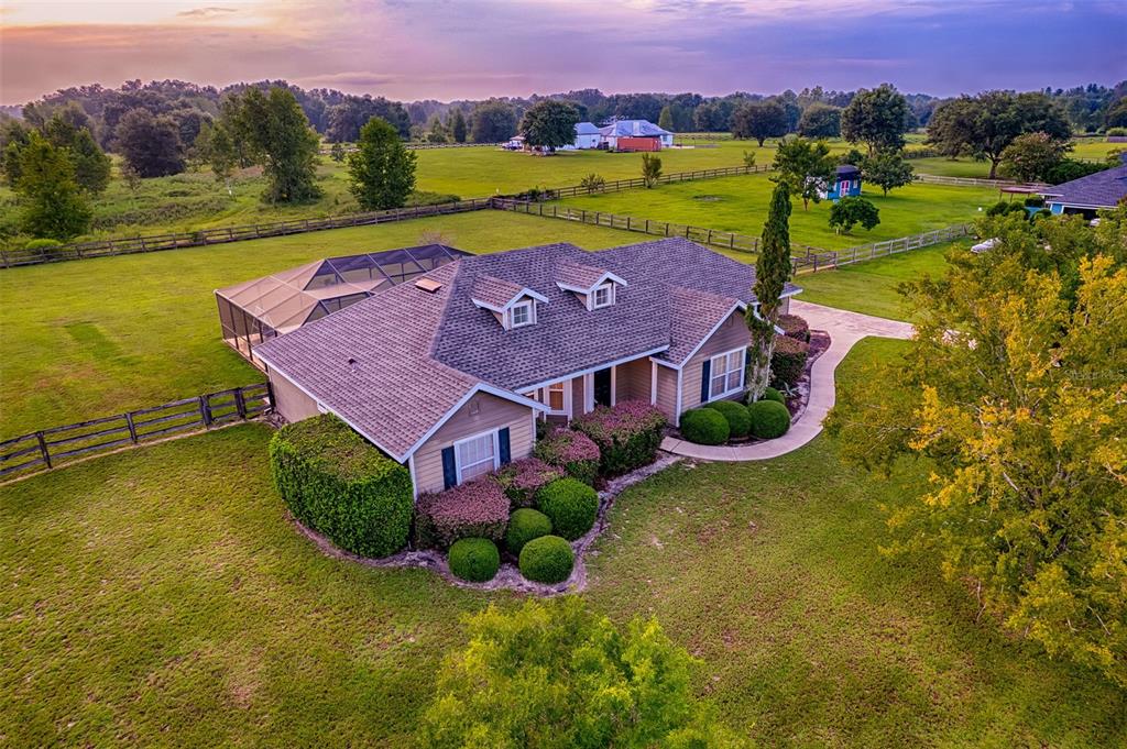9640 Southwest 102nd Terrace Gainesville, FL 32608 - Photo 1 of 1 an aerial view of a house with a garden and a yard