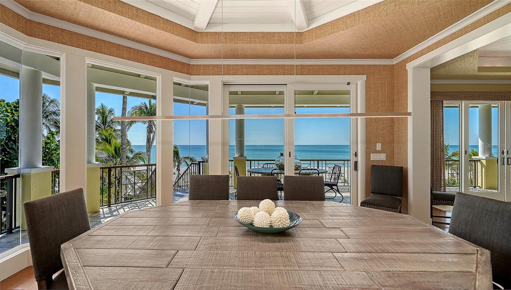 6477 Gulfside Road Longboat Key, FL 34228 - Photo 25 of 65 a living room with furniture and a large window