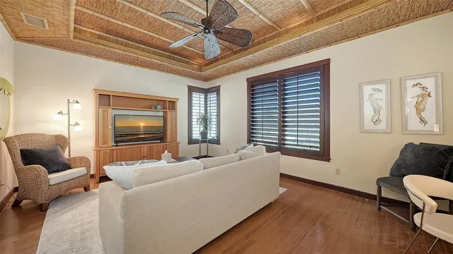 a bedroom with a large bed and a large window