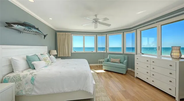 a bedroom with two beds and a dresser