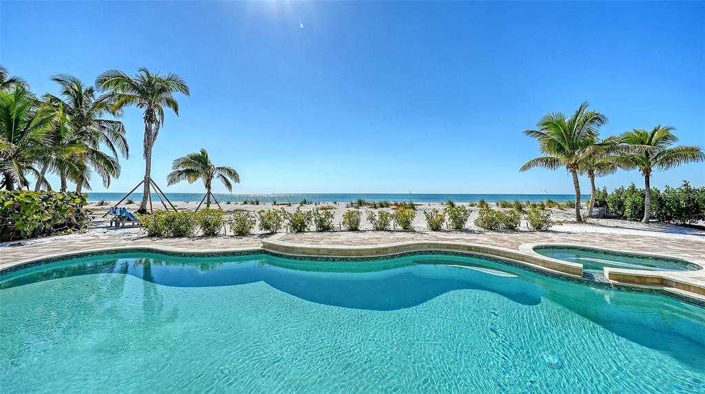 6477 Gulfside Road Longboat Key, FL 34228 - Photo 3 of 65 a view of a swimming pool and a yard