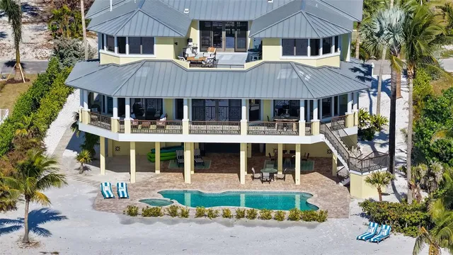 a view of a swimming pool and a yard