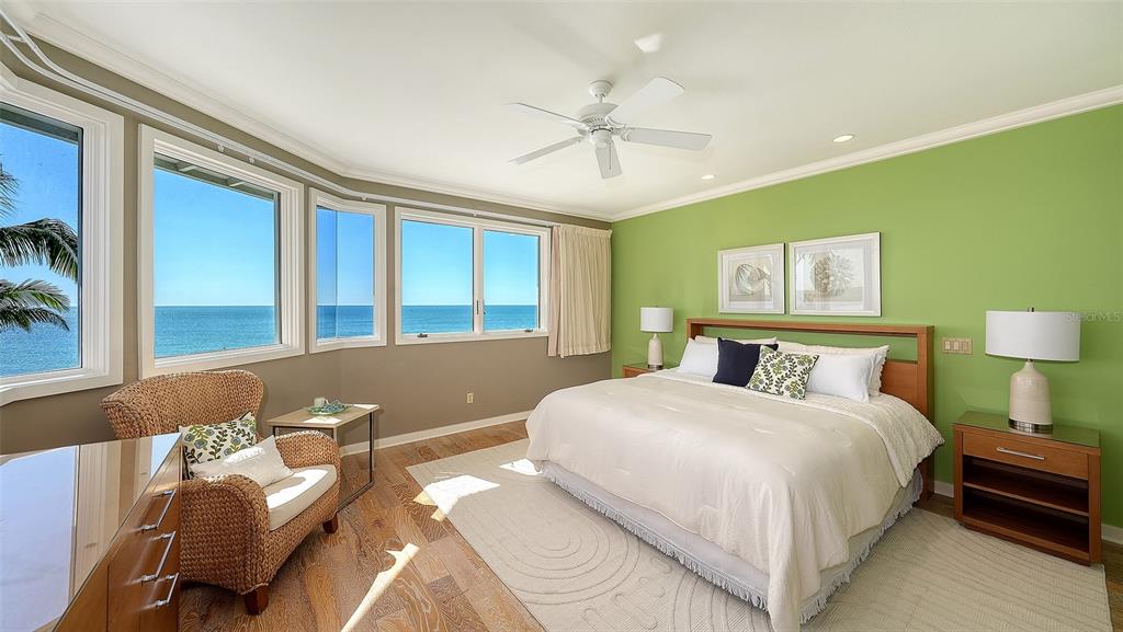 6477 Gulfside Road Longboat Key, FL 34228 - Photo 32 of 65 a bedroom with a bed and window