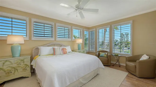 a view of a terrace with chairs and a table