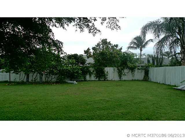 6715 Southeast Raintree Avenue Stuart, FL 34997 - Photo 9 of 12 Exterior Back.