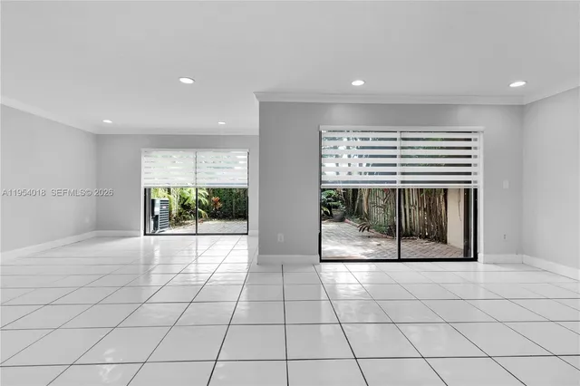 a view of an empty room and window