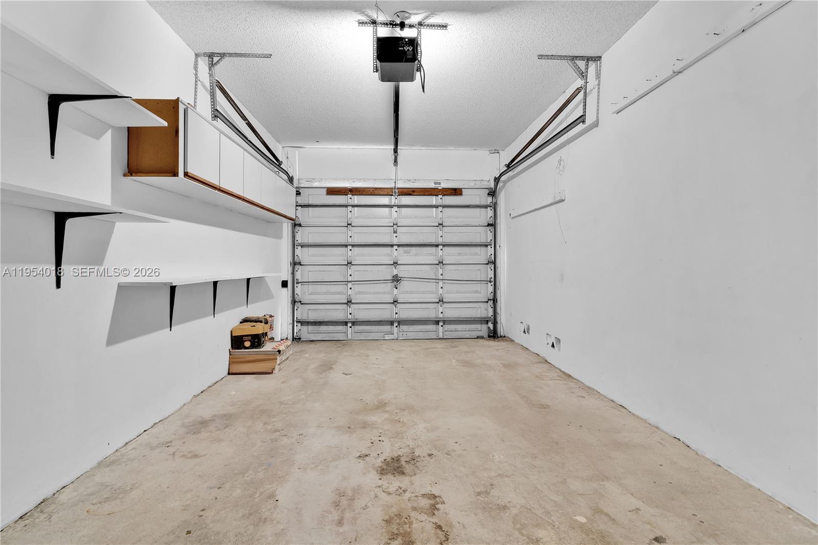 11668 Southwest 91st Terrace, Unit 11668 Miami, FL 33176 - Photo 28 of 39 a view of empty room with stairs and mirrors