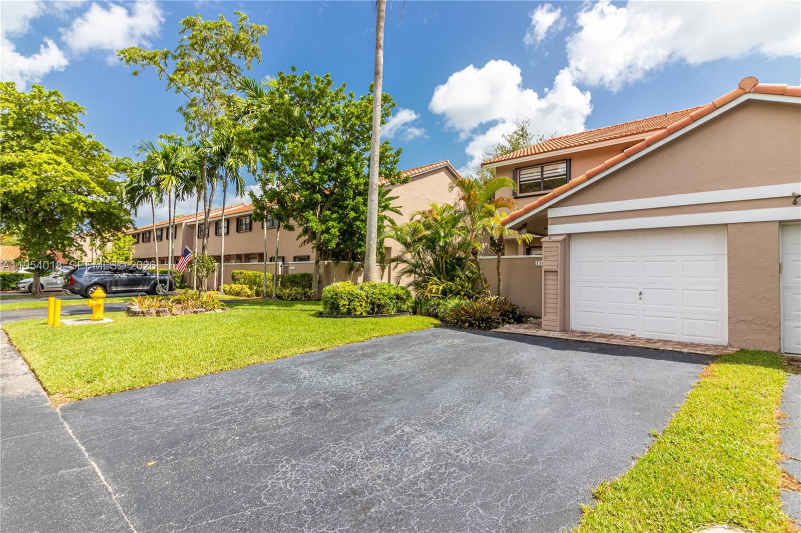 11668 Southwest 91st Terrace, Unit 11668 Miami, FL 33176 - Photo 3 of 39 a view of a house with a backyard