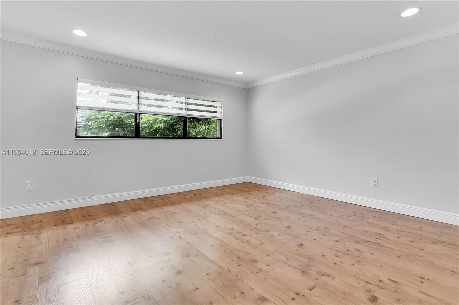11668 Southwest 91st Terrace, Unit 11668 Miami, FL 33176 - Photo 34 of 39 an empty room with a window