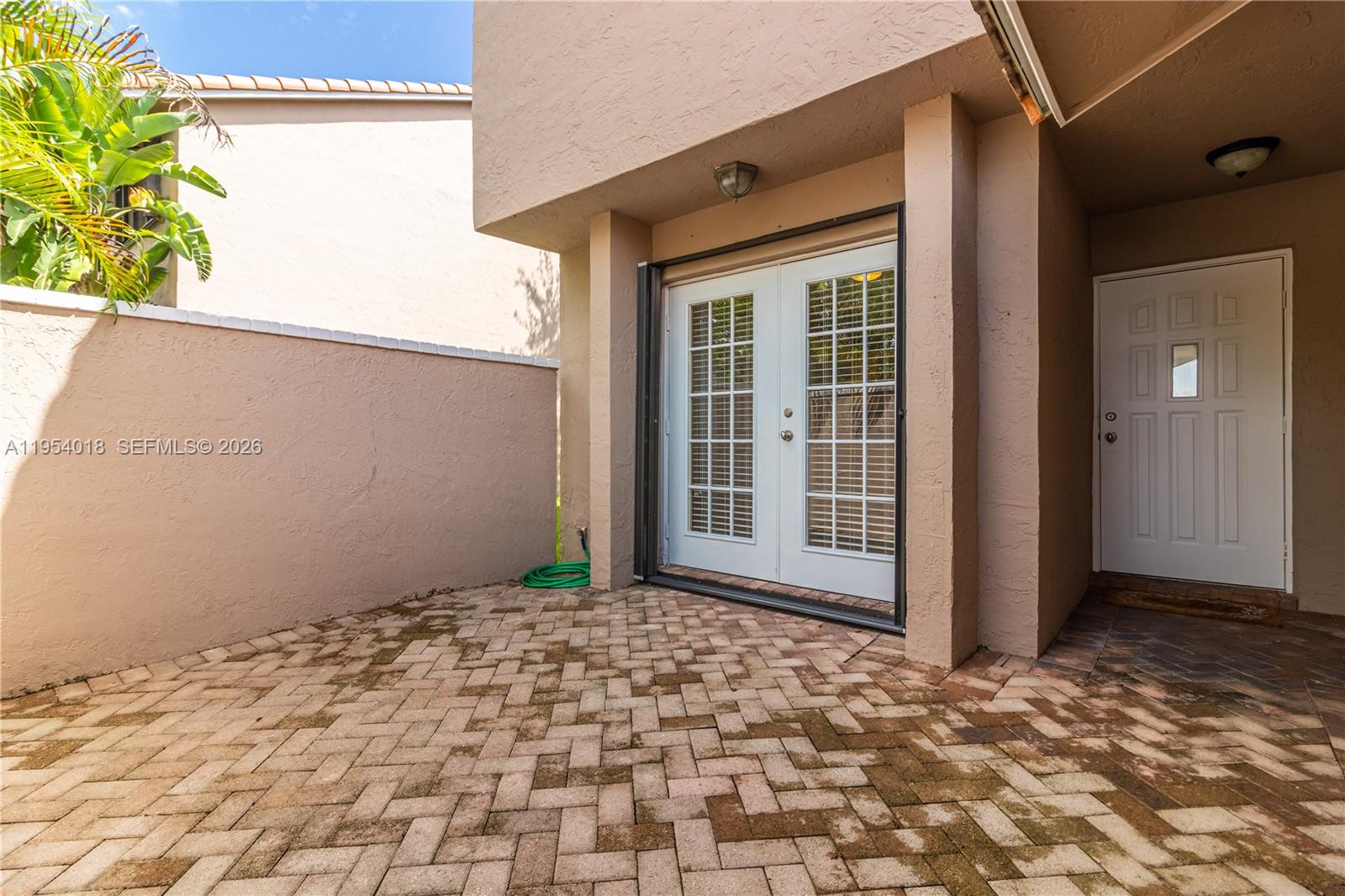 11668 Southwest 91st Terrace, Unit 11668 Miami, FL 33176 - Photo 5 of 39 a view of a backyard of a house