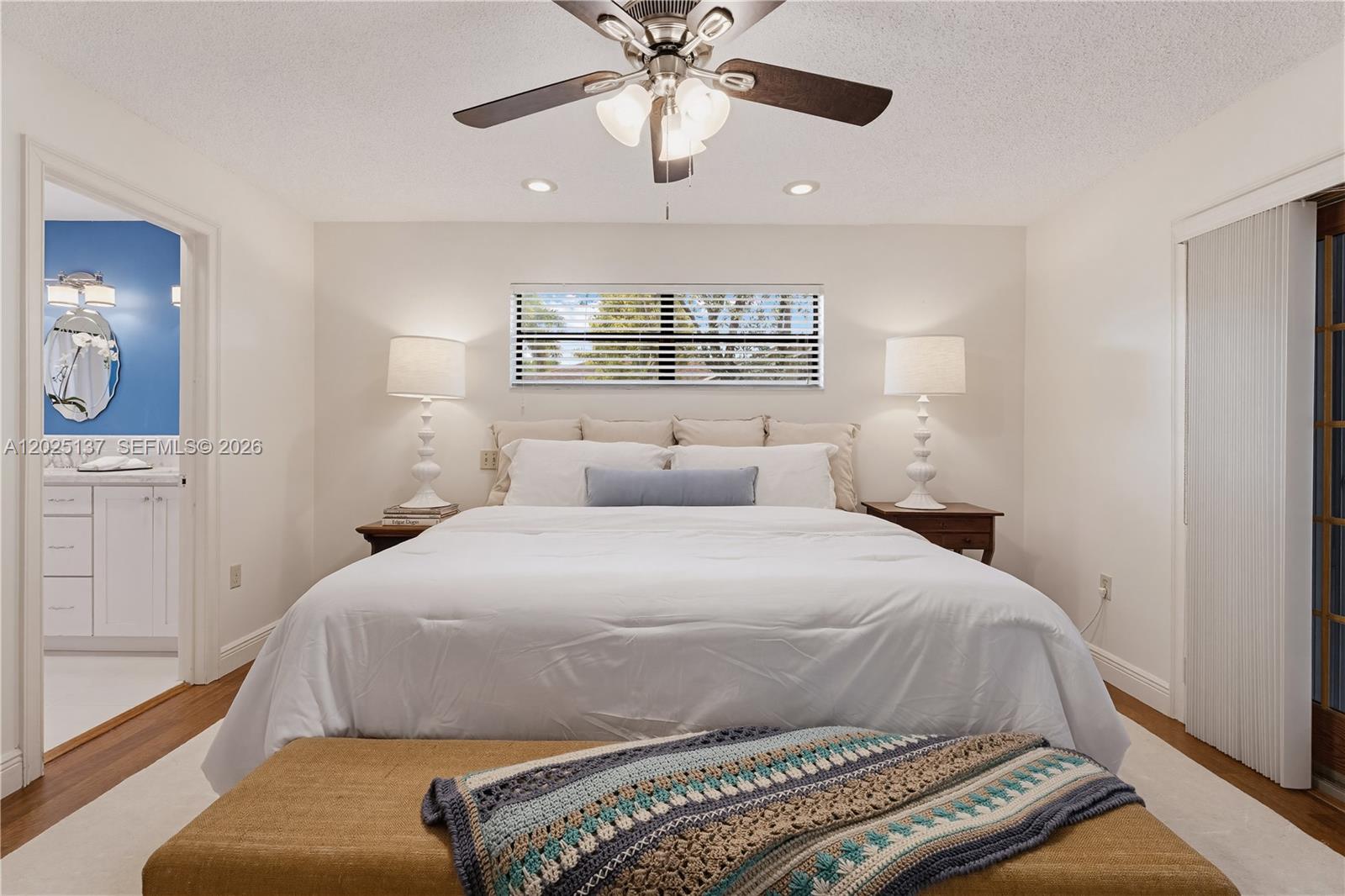 11480 Southwest 96th Terrace Miami, FL 33176 - Photo 27 of 54 a bedroom with a bed and window