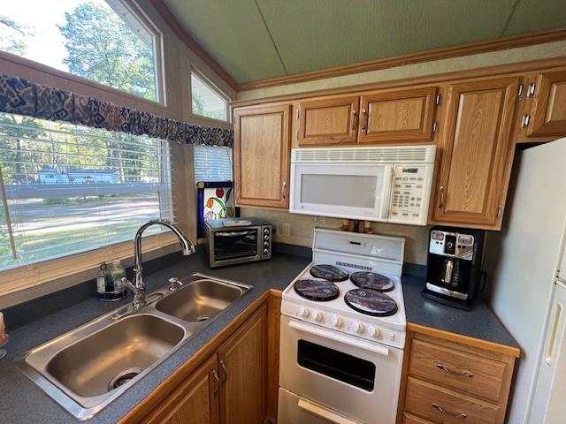 2795 East 28th Road Marseilles, IL 61341 - Photo 27 of 75 a kitchen with a stove and a sink