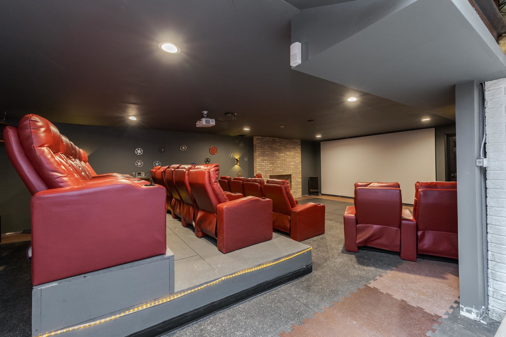1810 Cardinal Court Pontiac, IL 61764 - Photo 64 of 88 a media room with lots of chairs and a projector screen