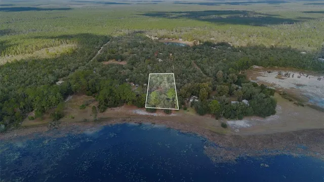 a view of a lake view with a trees