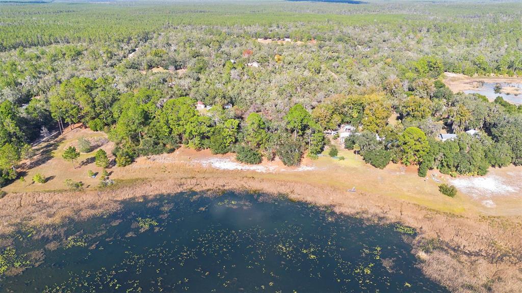 Tbd Southeast 256th Avenue Umatilla, FL 32784 - Photo 9 of 30 a view of a yard with an outdoor space