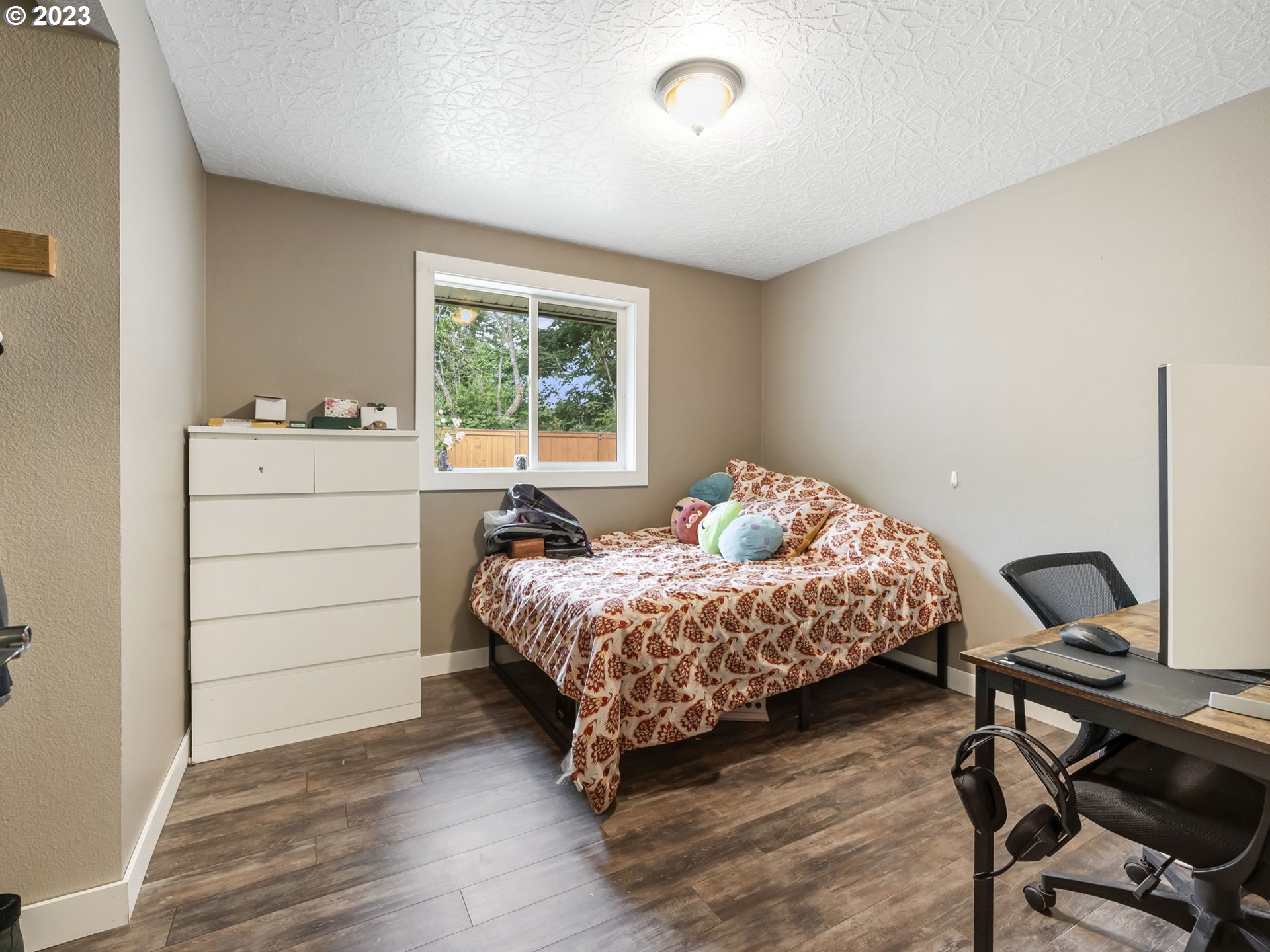 4413 Addy Loop Washougal, WA 98671 - Photo 15 of 28 a bedroom with a bed and a window