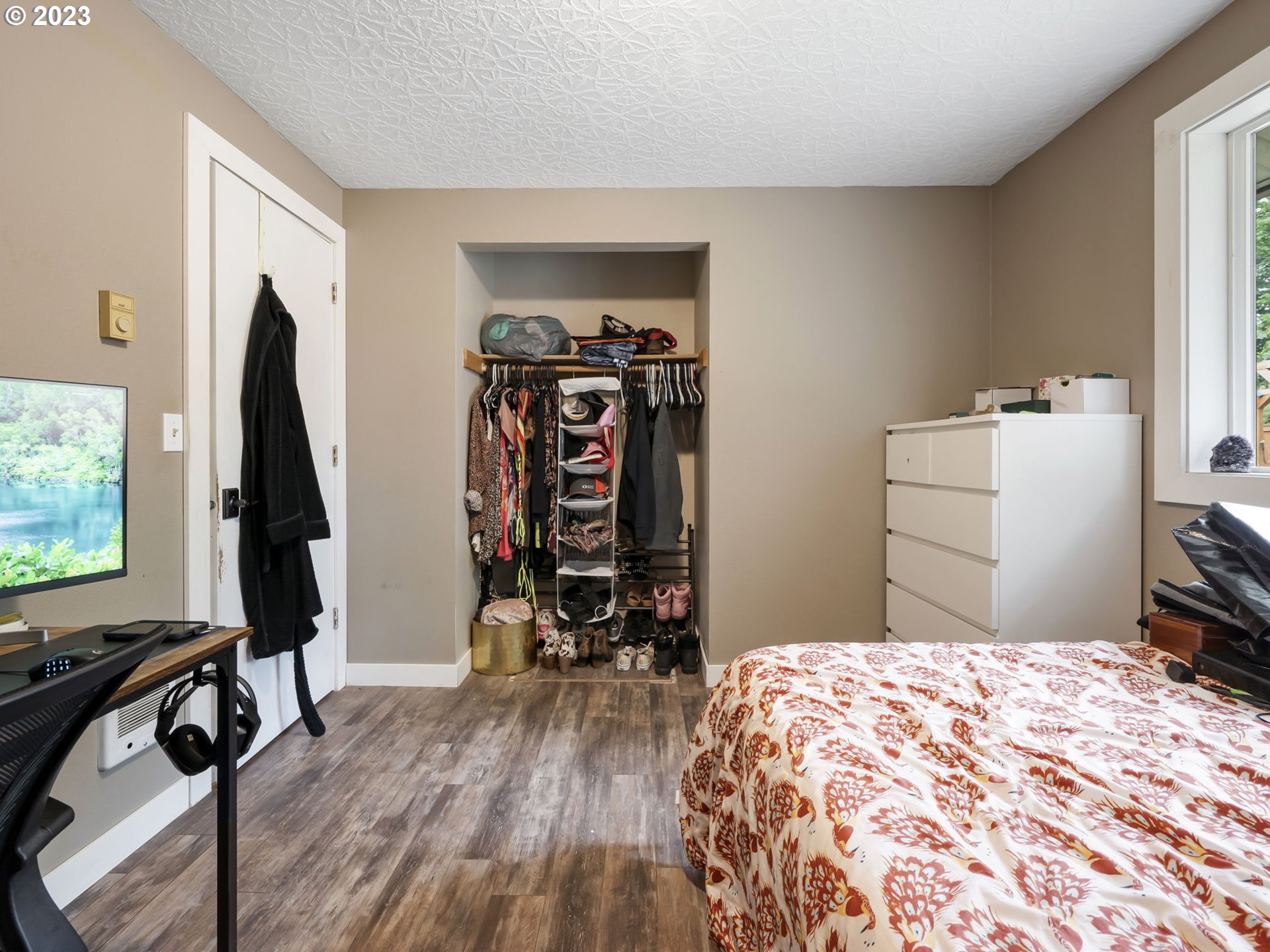 4413 Addy Loop Washougal, WA 98671 - Photo 16 of 28 a bedroom with a bed and a flat tv screen