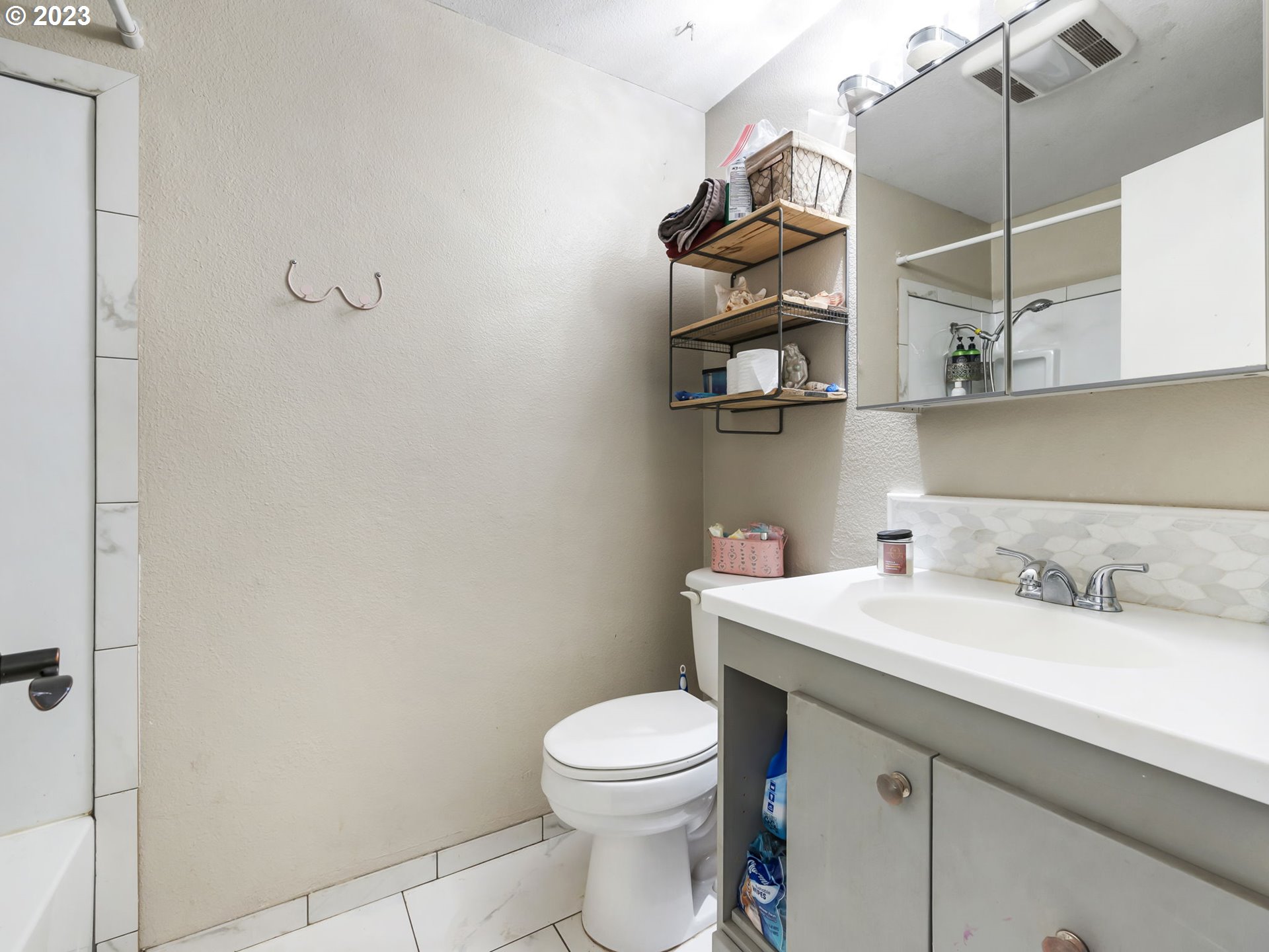 4413 Addy Loop Washougal, WA 98671 - Photo 17 of 28 a bathroom with a sink a toilet and shower