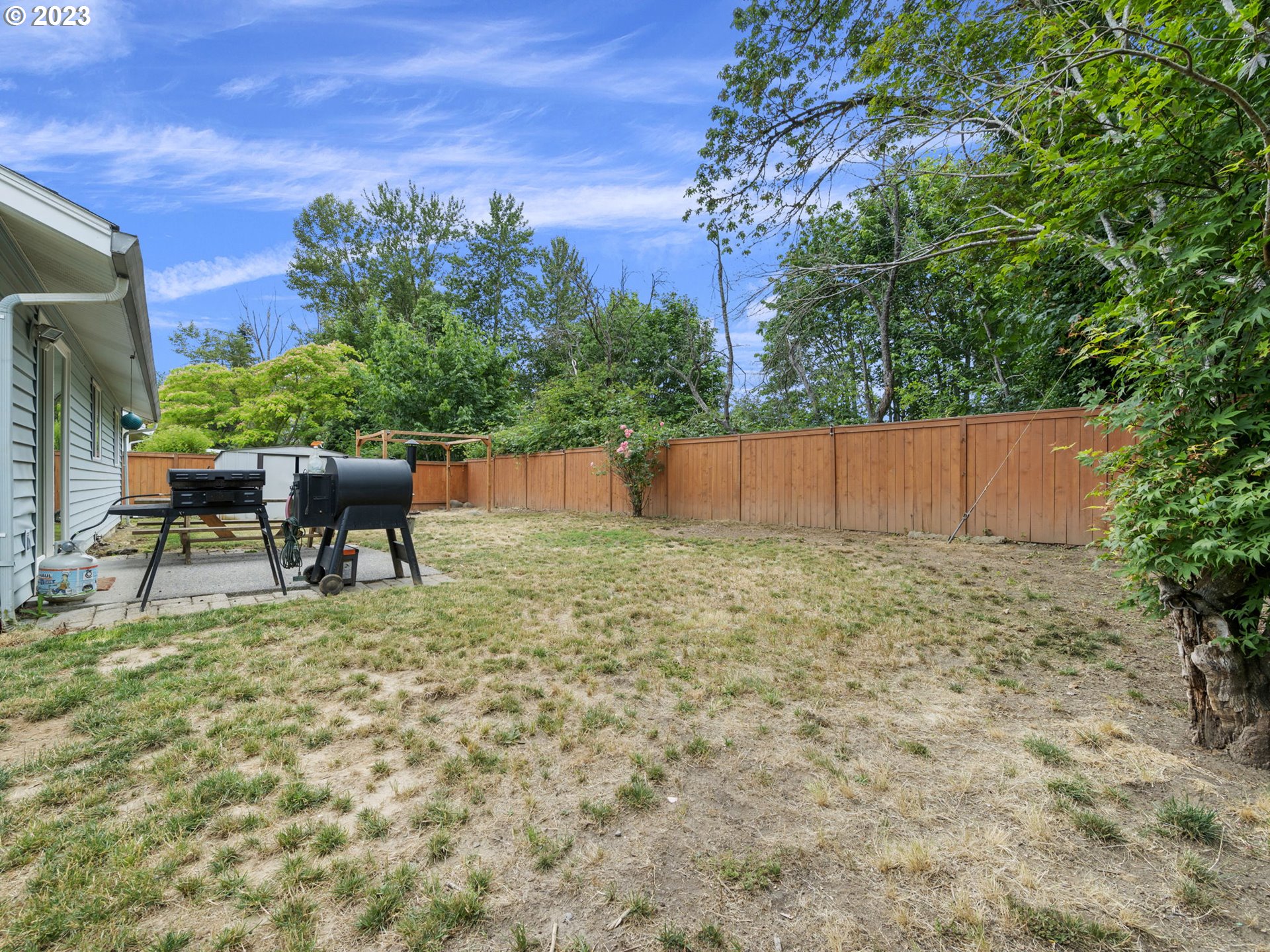 4413 Addy Loop Washougal, WA 98671 - Photo 23 of 28 a backyard of a house with table and chairs