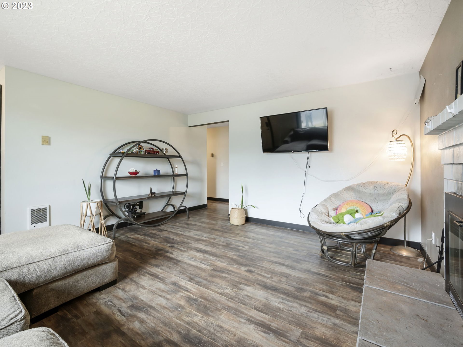 4413 Addy Loop Washougal, WA 98671 - Photo 3 of 28 a living room with furniture and a flat screen tv