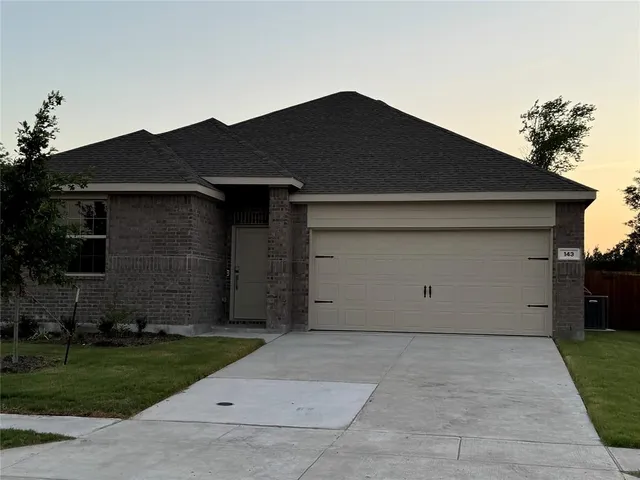 a front view of house with yard