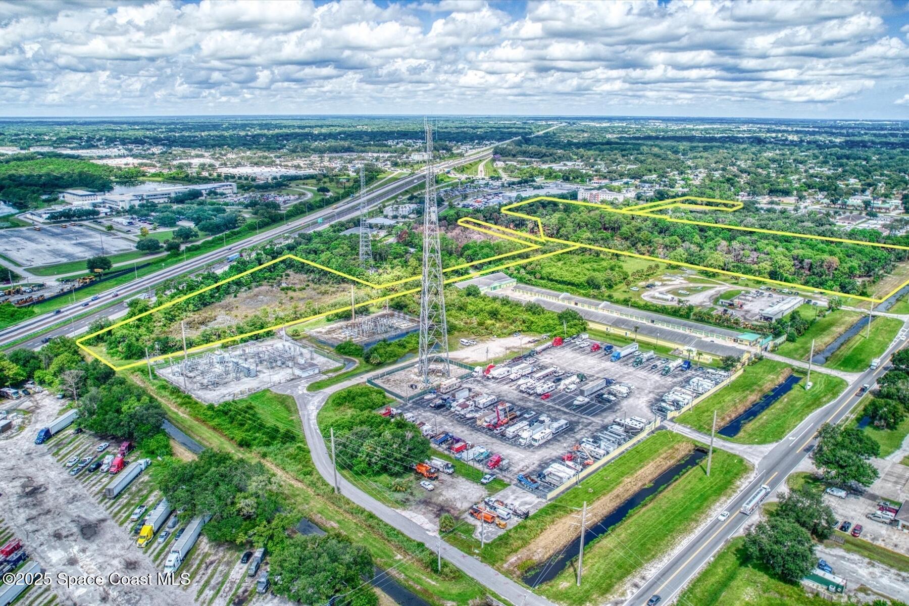 1206 Malabar Road Palm Bay, FL 32909 - Photo 9 of 15 a view of a yard with an outdoor space