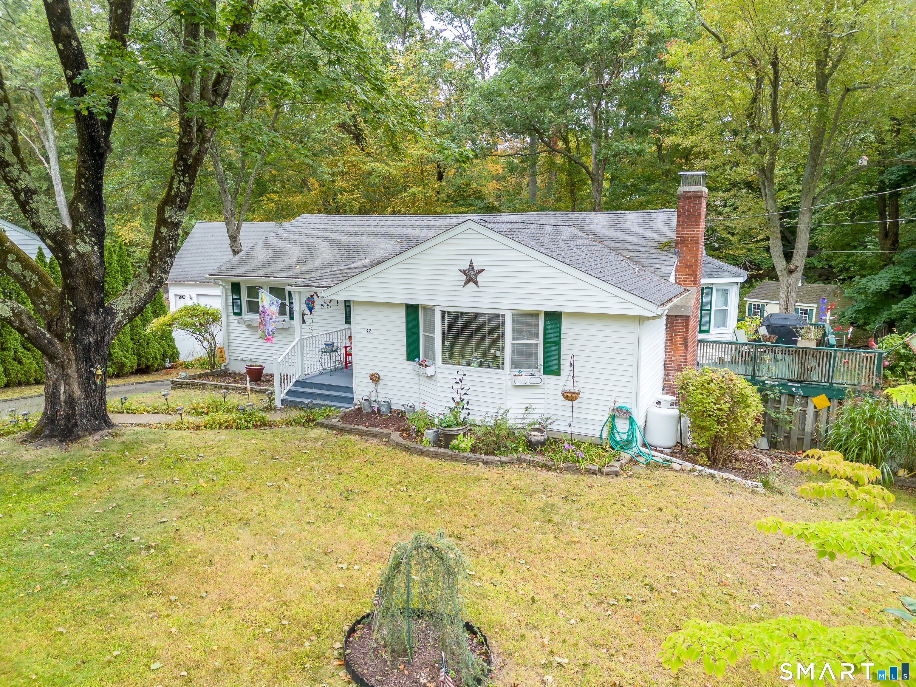 a front view of a house with swimming pool