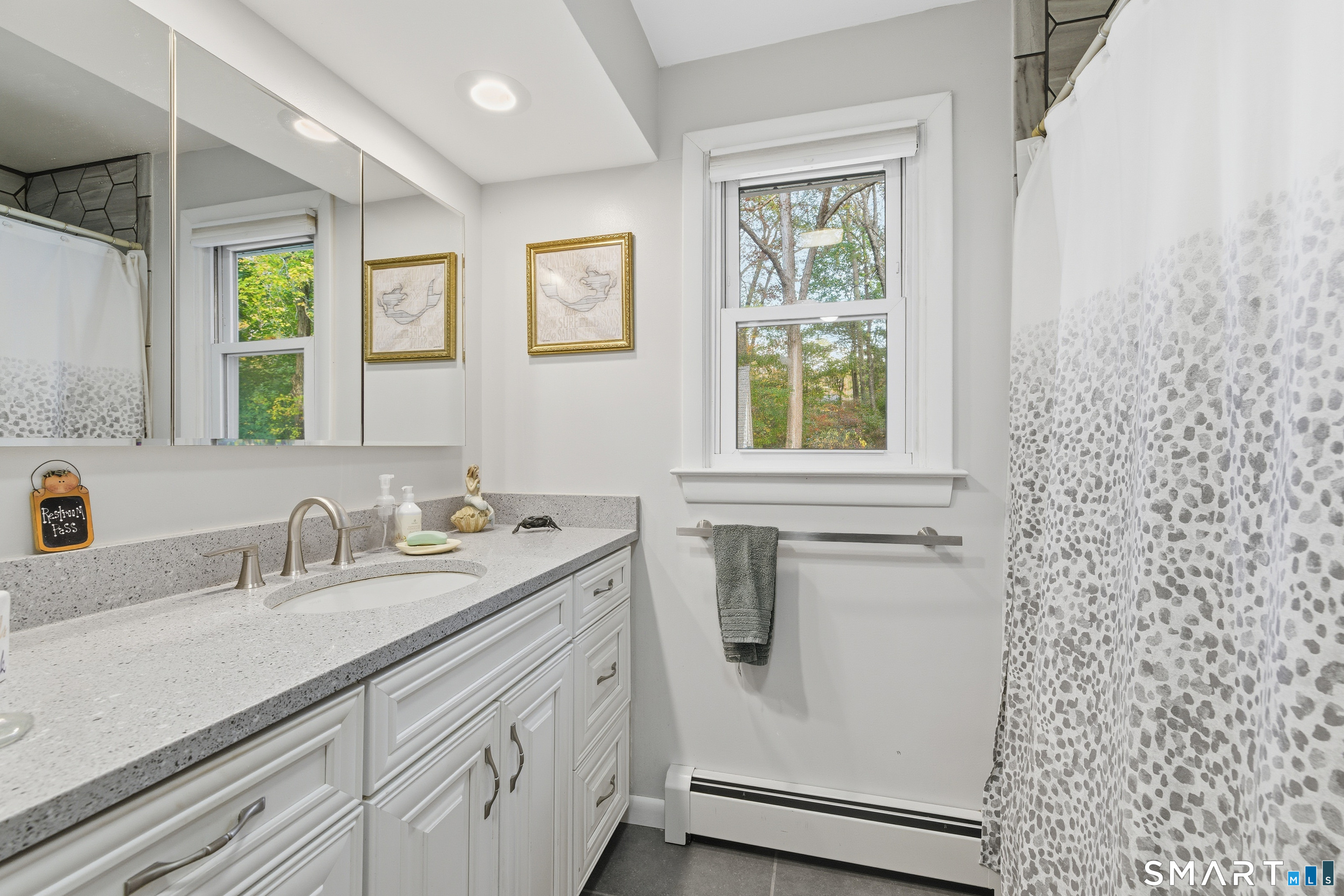 32 Richard Road Ledyard, CT 06335 - Photo 13 of 32 a bathroom with a sink a vanity and a window